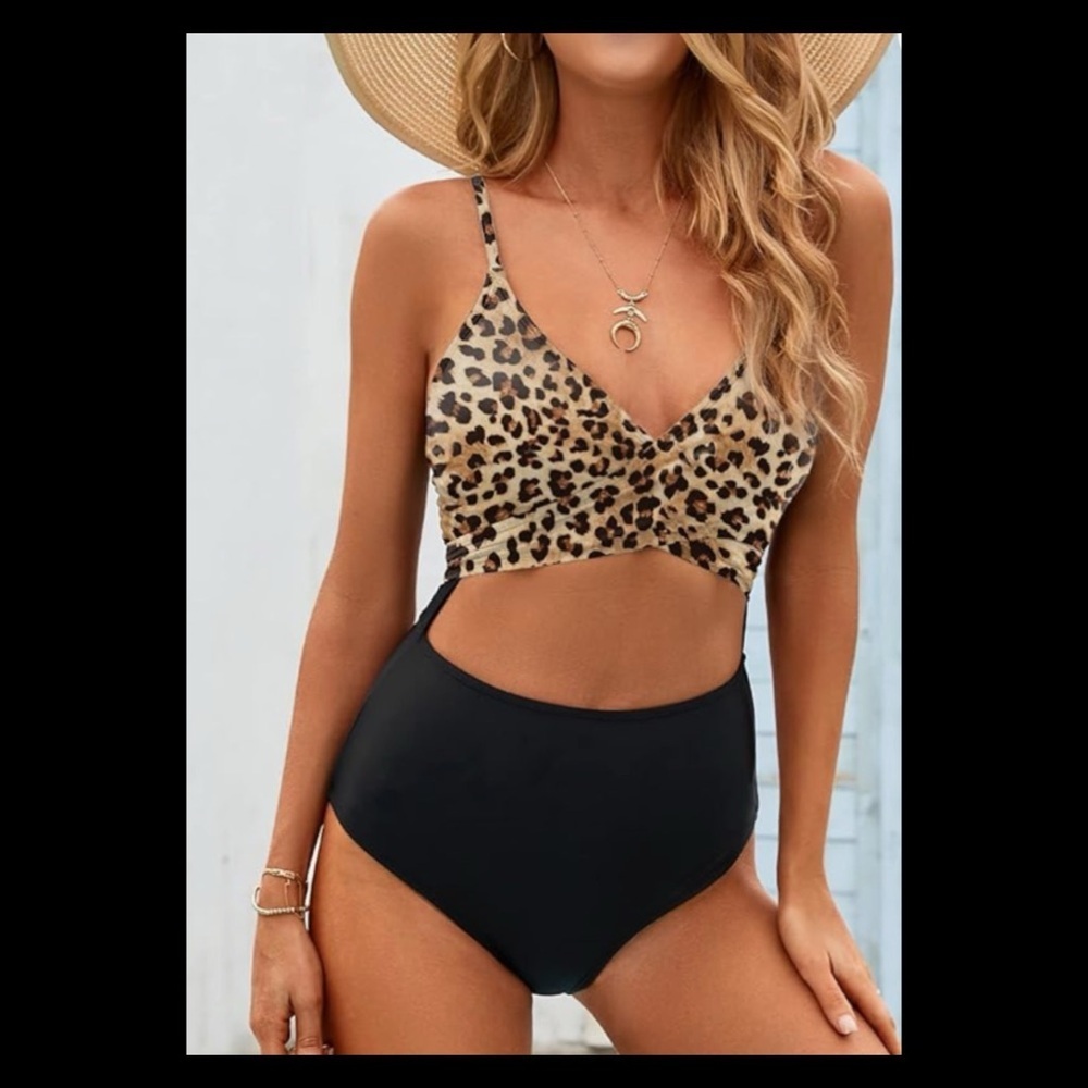 Animal print black bottom one piece swimsuit.